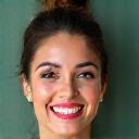 Retrato de Ana G. sonriente y radiante